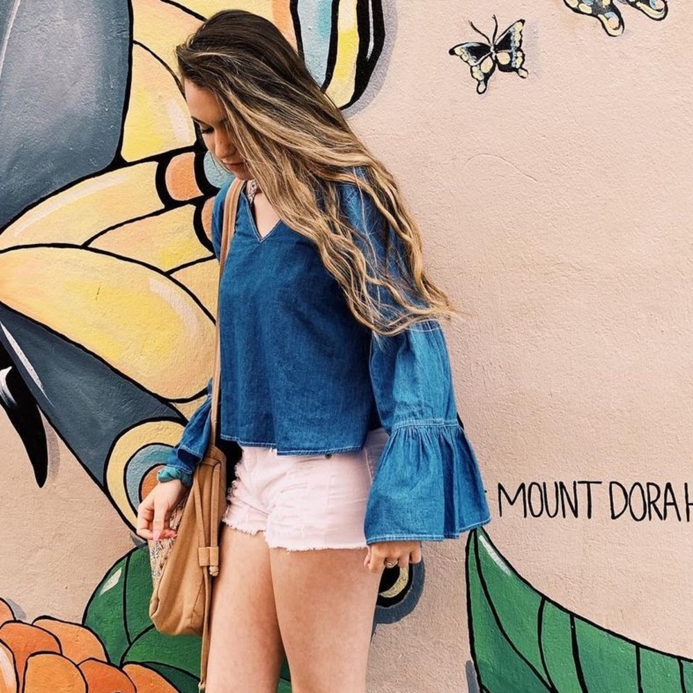 Wide arm long sleeve denim top